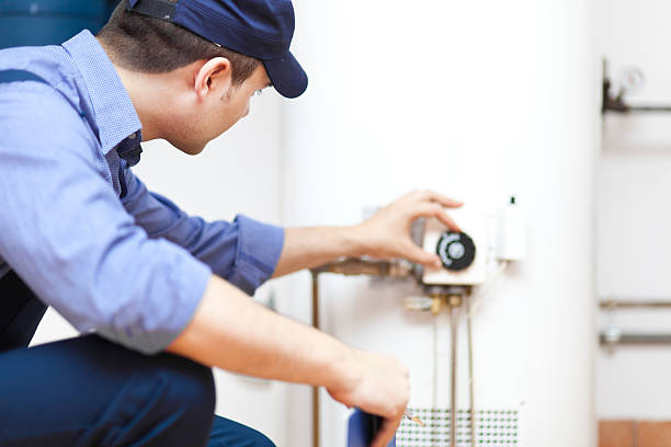Leak Lock Service Inc. Technician water heater repairing